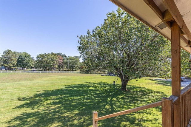 view of yard with a rural view