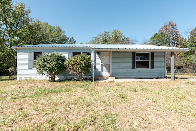 view of front of property with a front lawn