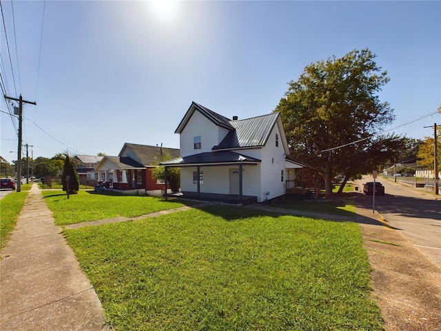 view of front of property with a front lawn