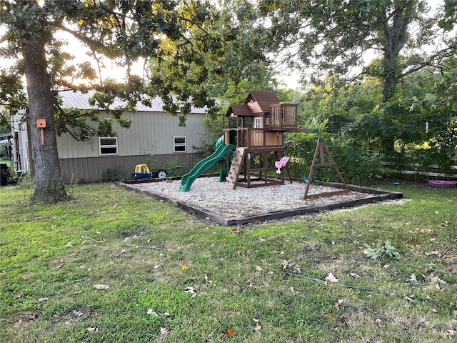 view of play area with a yard