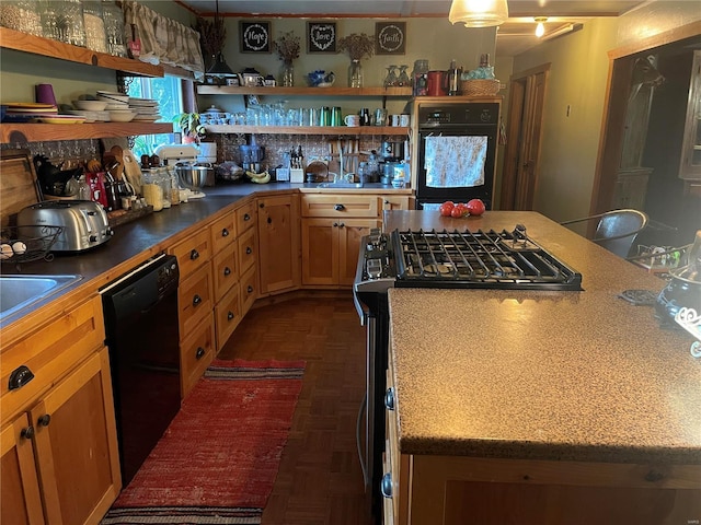 kitchen with black appliances and dark parquet flooring