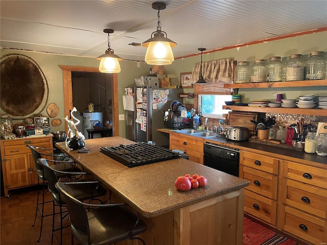 kitchen with a kitchen breakfast bar, black dishwasher, pendant lighting, and sink