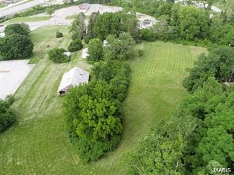 birds eye view of property featuring a rural view