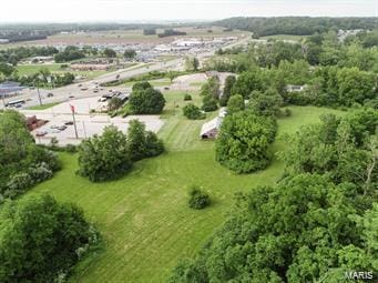 birds eye view of property featuring a rural view