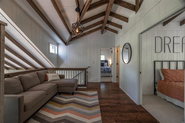 living room featuring vaulted ceiling with beams, wood walls, and dark hardwood / wood-style flooring