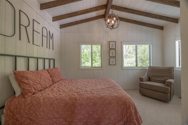 carpeted bedroom featuring lofted ceiling with beams, wood walls, and a chandelier