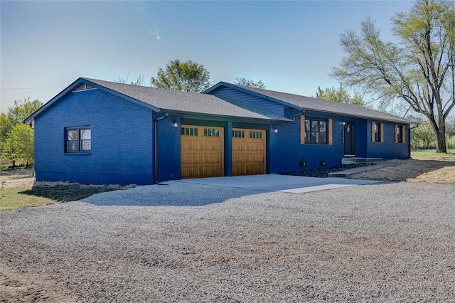 ranch-style home with a garage