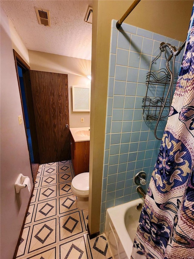 full bathroom with a textured ceiling, vanity, toilet, and shower / bathtub combination with curtain