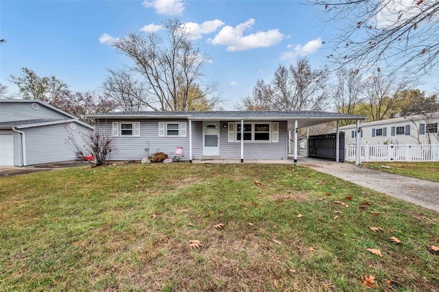 ranch-style house featuring a front lawn, a porch, and a carport