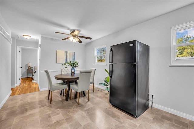 dining room featuring ceiling fan