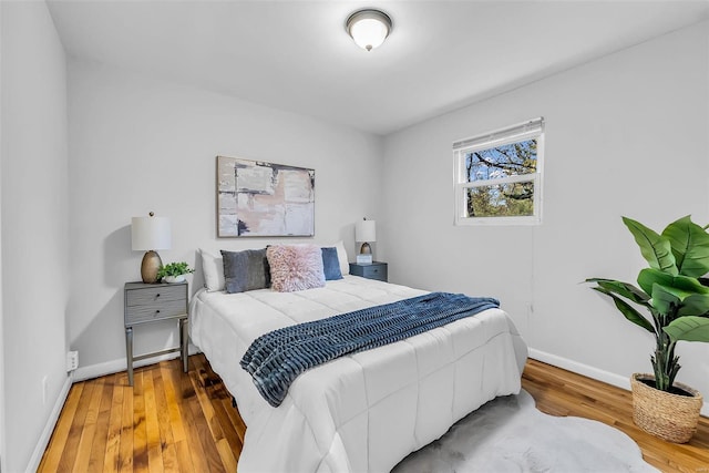 bedroom featuring hardwood / wood-style flooring