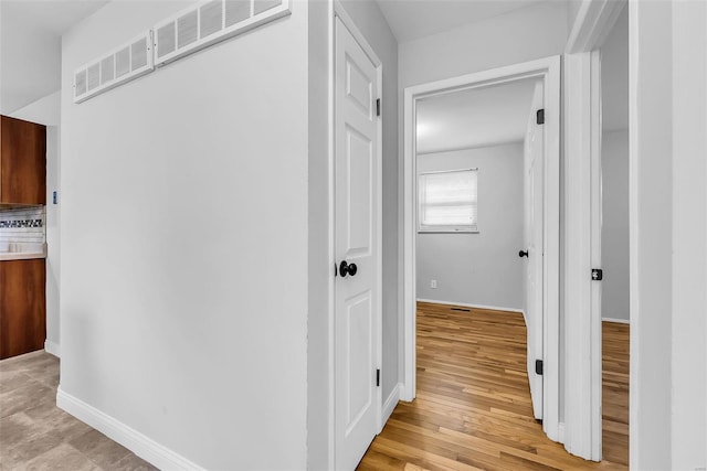 hall featuring light hardwood / wood-style flooring