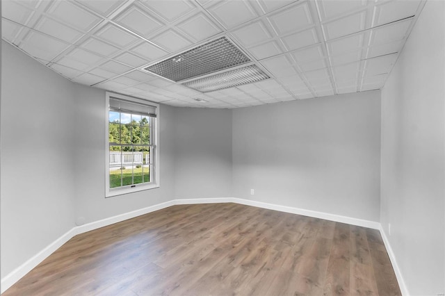 unfurnished room featuring hardwood / wood-style flooring