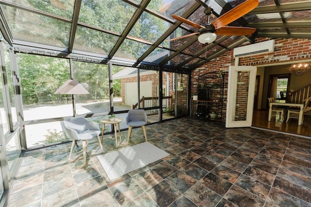 unfurnished sunroom with ceiling fan, lofted ceiling, and an AC wall unit