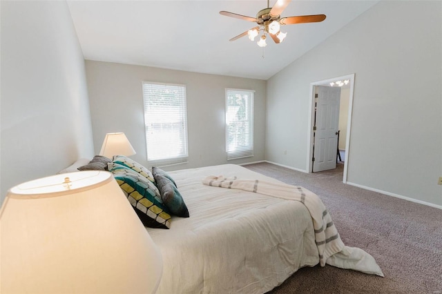 carpeted bedroom featuring ceiling fan and vaulted ceiling