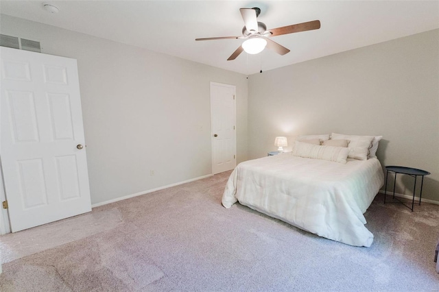 bedroom with light carpet and ceiling fan