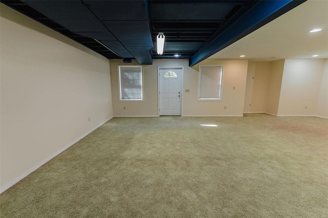 basement with carpet flooring