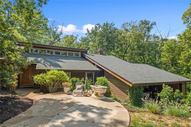 view of front of house with a patio area