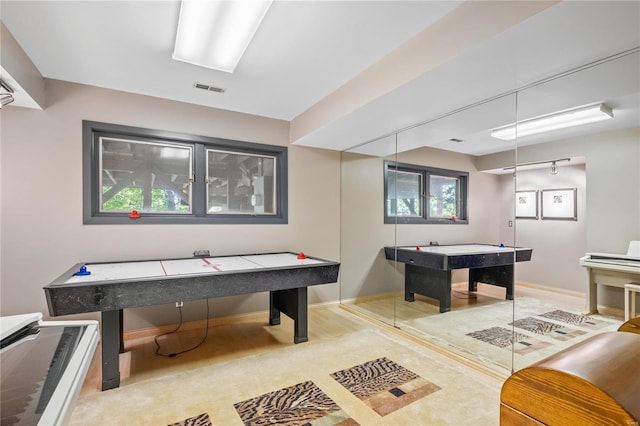 playroom with wood-type flooring