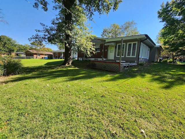 view of yard featuring a deck