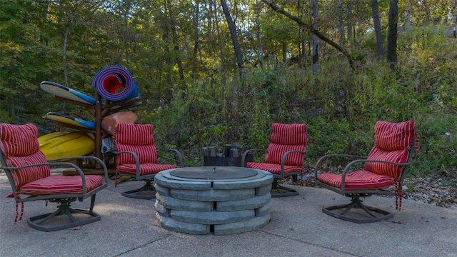 view of patio with a fire pit