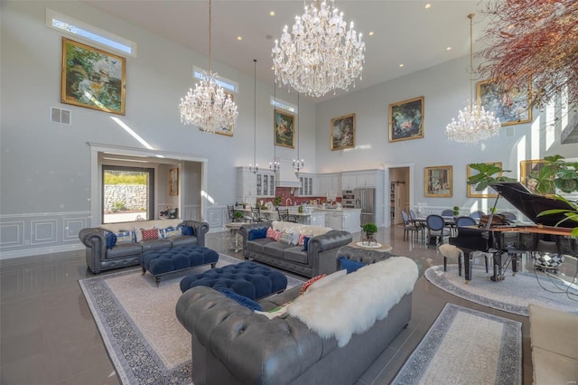 living room featuring a towering ceiling and tile patterned flooring