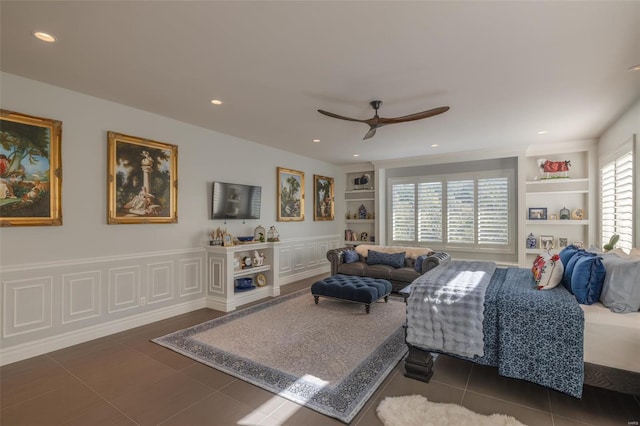 bedroom featuring ceiling fan and dark tile patterned flooring