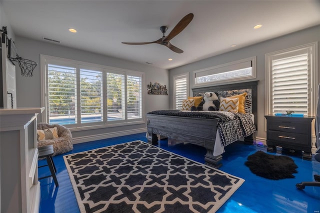 bedroom featuring dark hardwood / wood-style floors and ceiling fan