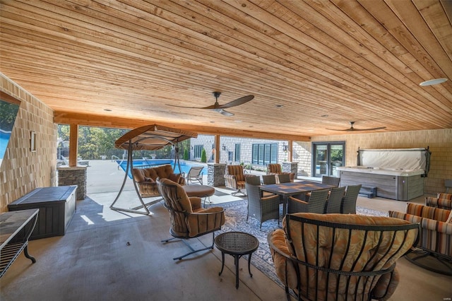 view of patio with ceiling fan and an outdoor hangout area