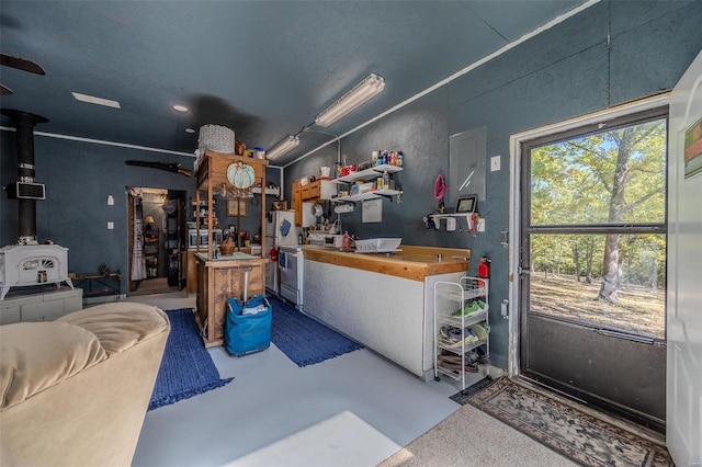 interior space with ceiling fan