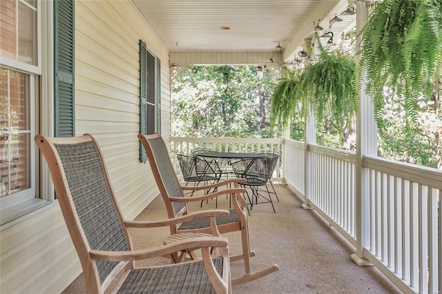 balcony featuring outdoor dining space