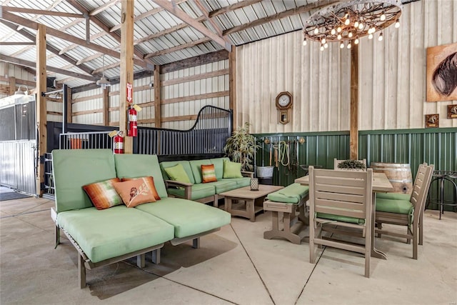 view of patio / terrace featuring outdoor dining area, fence, and an outdoor hangout area