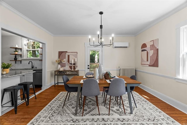 dining room featuring a wall mounted air conditioner, a notable chandelier, radiator heating unit, and ornamental molding