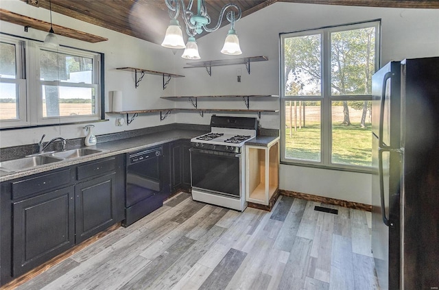 kitchen featuring light hardwood / wood-style floors, wood ceiling, black appliances, lofted ceiling, and sink