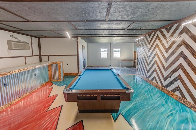 game room featuring billiards and a wall unit AC