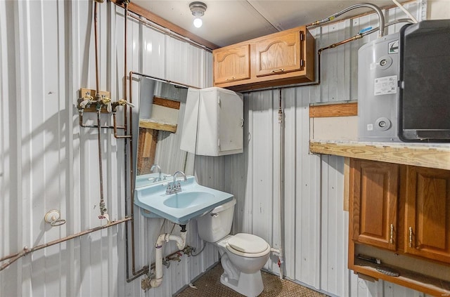 bathroom featuring sink and toilet