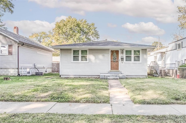 view of front of property with a front lawn