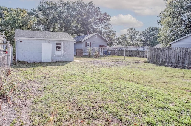 view of yard with a storage shed