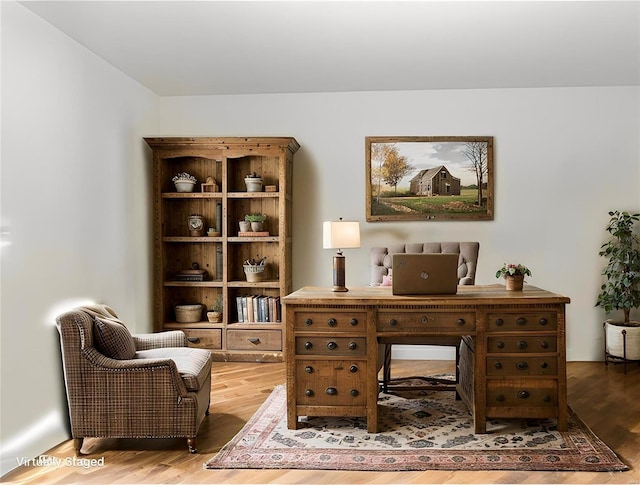 office featuring hardwood / wood-style floors