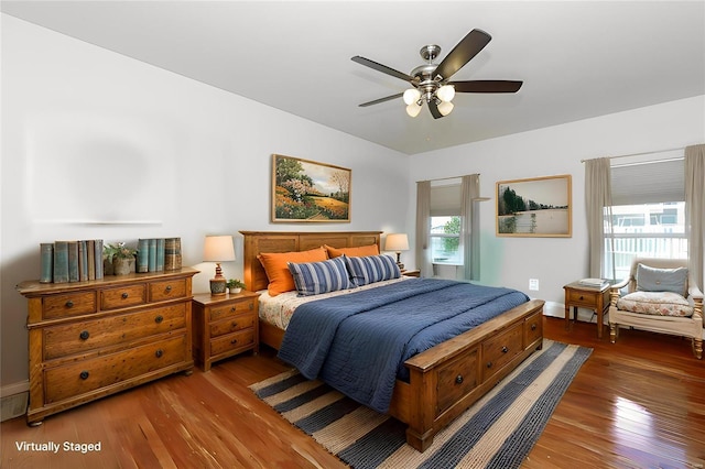 bedroom featuring hardwood / wood-style flooring and ceiling fan