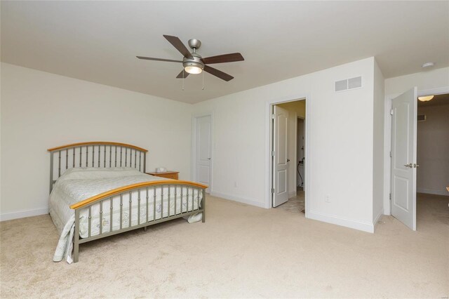 bedroom with light colored carpet and ceiling fan