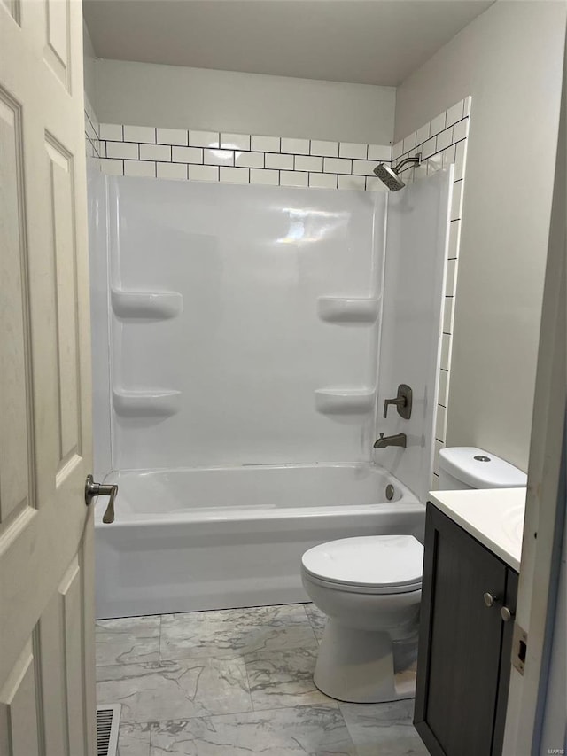 full bathroom with shower / tub combination, vanity, and toilet