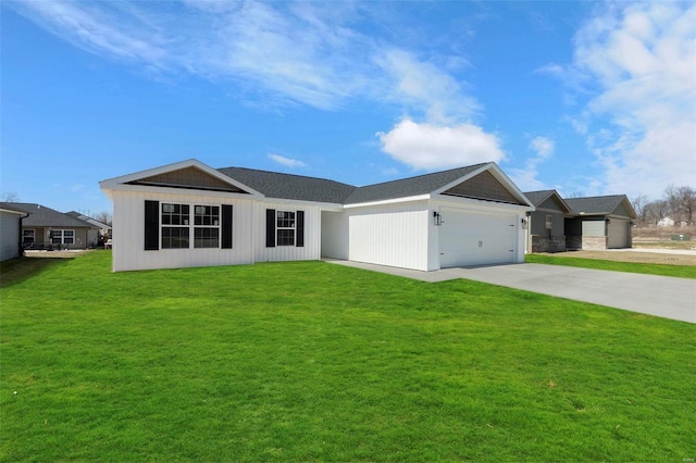 view of front of property with a garage, concrete driveway, and a front yard