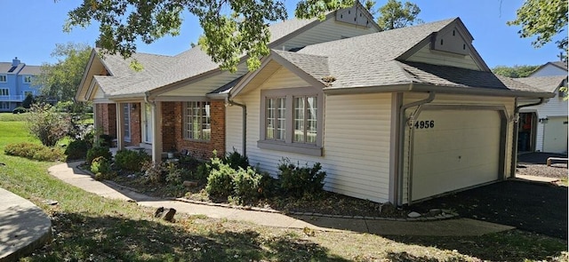 view of property exterior with a garage