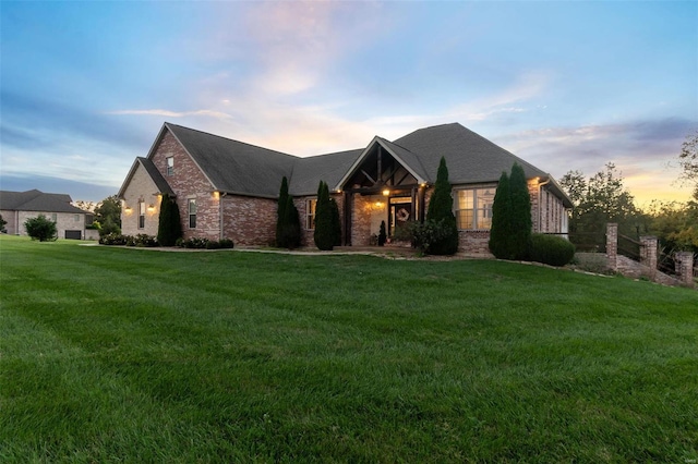 view of front of house with a lawn