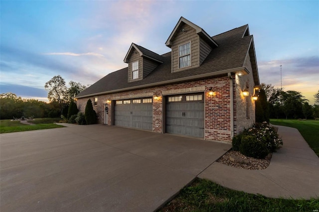 property exterior at dusk with a garage