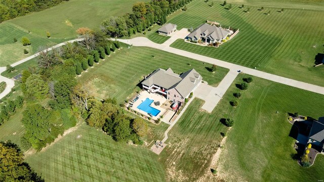 birds eye view of property featuring a rural view