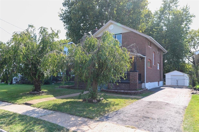 obstructed view of property with a front yard, an outdoor structure, and a garage