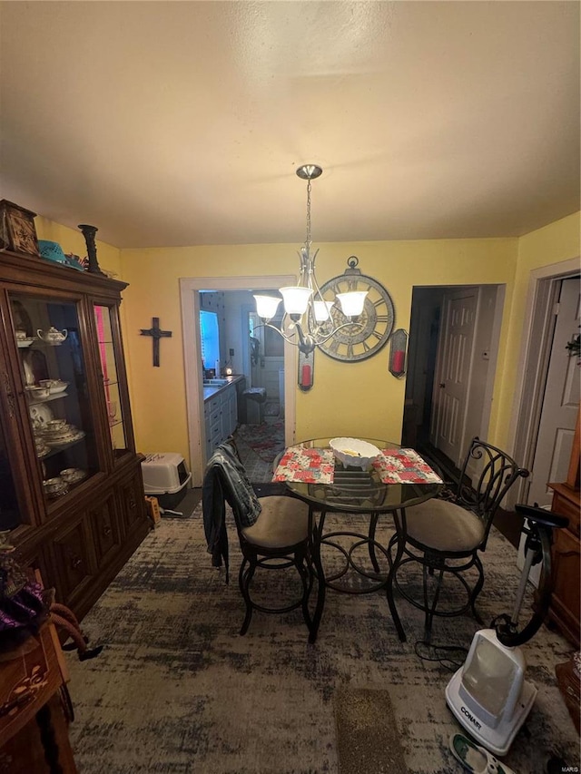 dining room with a chandelier