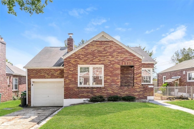 view of property with a front yard and a garage